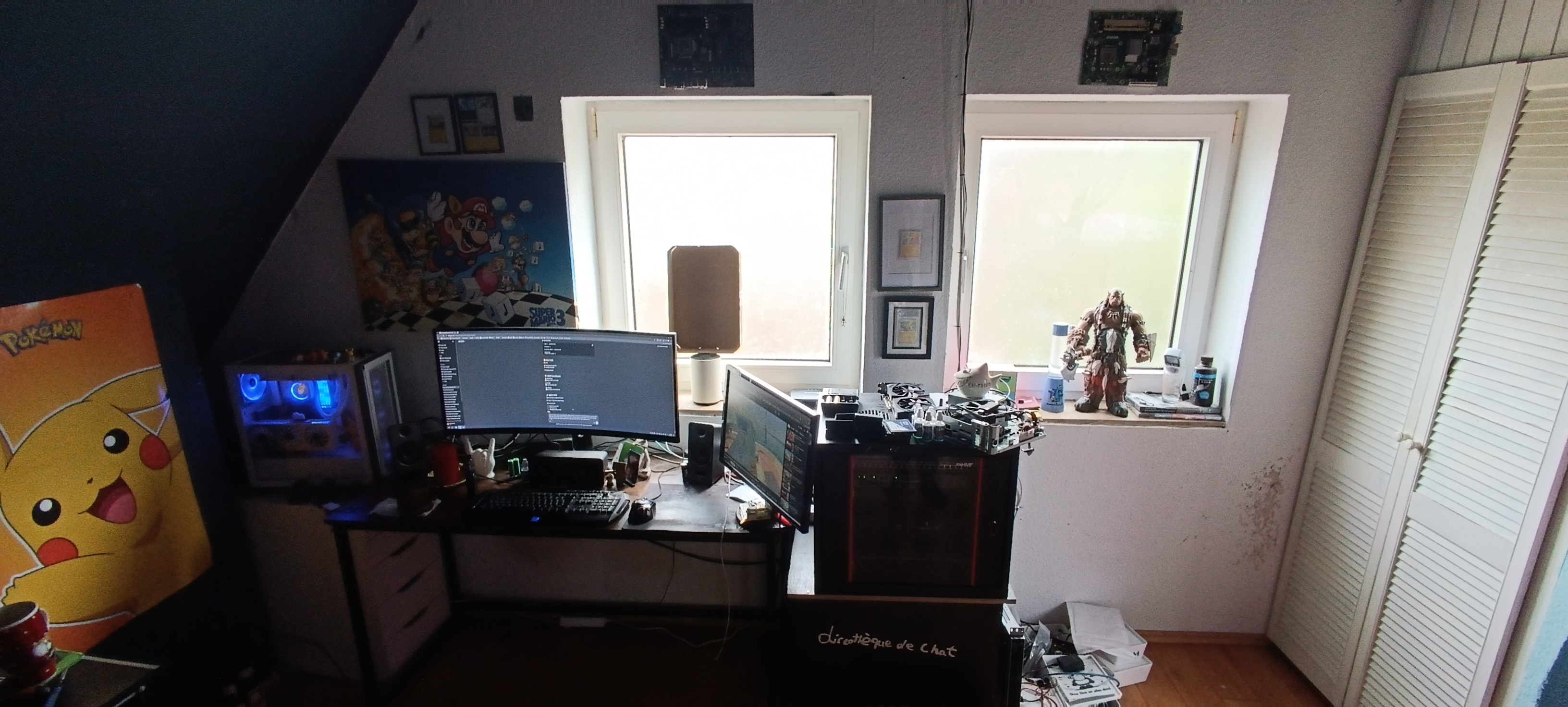 A filament 3D printer in a home workspace.